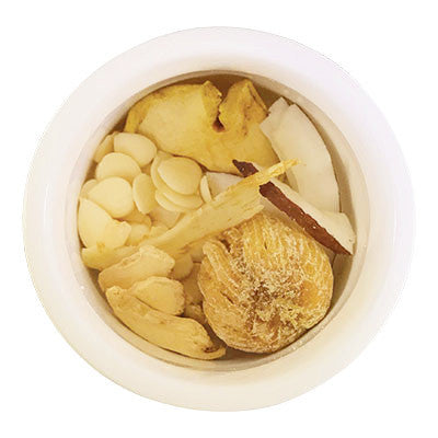 Image of ingredients for root + spring's Dried Ginger & Palm Coconut "Beat the Bloat" Chinese Herbal Tea Mix.