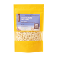 image of Root + Spring South Almond (Sweet Almond) featuring a clear window that displays the light beige almond flakes inside. The pouch has a lavender label with product details and is set against a plain white background.