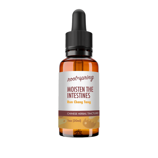 A 1 oz amber glass dropper bottle of Root+Spring Moisten the Intestines (Run Chong Tang) Chinese Herbal Tincture, featuring a white label with brown and yellow text, set against a plain white background.