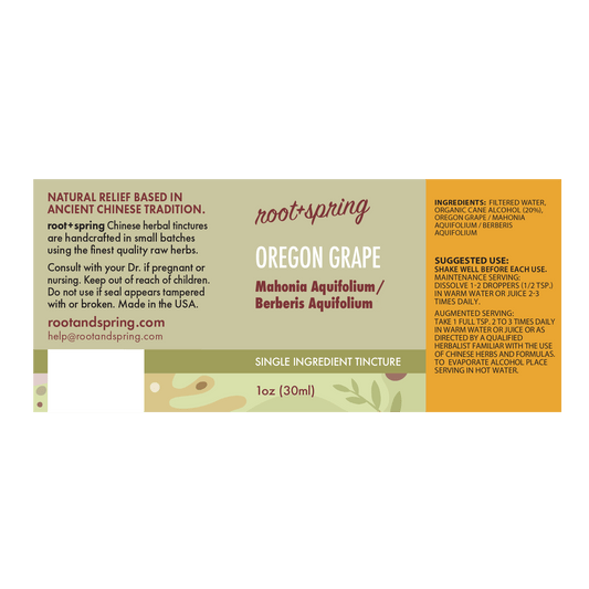 Root+Spring Oregon Grape single-ingredient tincture label, 1oz (30ml). The label features a split design with a warm beige left side and a bright orange right side, detailing ingredients, suggested use, and augmented serving.