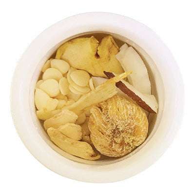 Image of ingredients for root + spring's Dried Ginger & Palm Coconut "Beat the Bloat" Chinese Herbal Tea Mix.